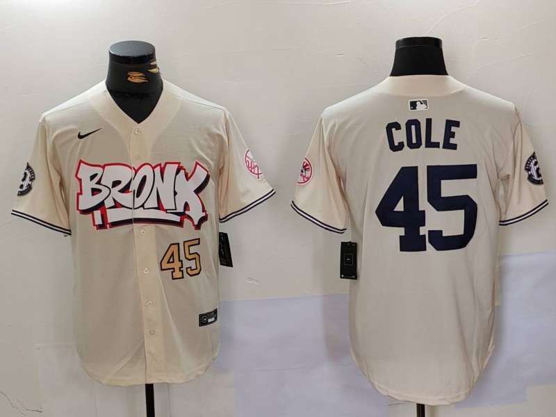 Men's New York Yankees #45 Gerrit Cole Cream The Bronx Graffiti V2 Vapor Limited Stitched Baseball Jersey